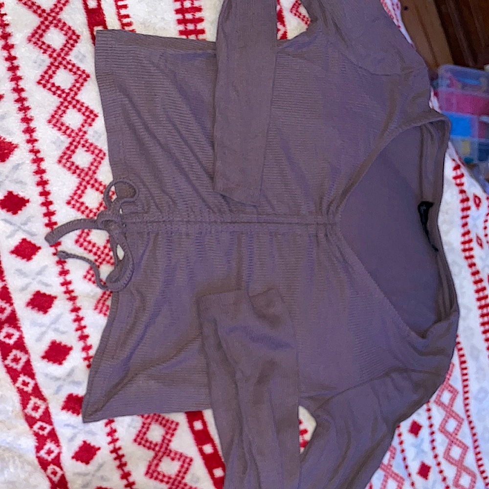 The brand is Derek Heart. It is a medium and in very good shape.